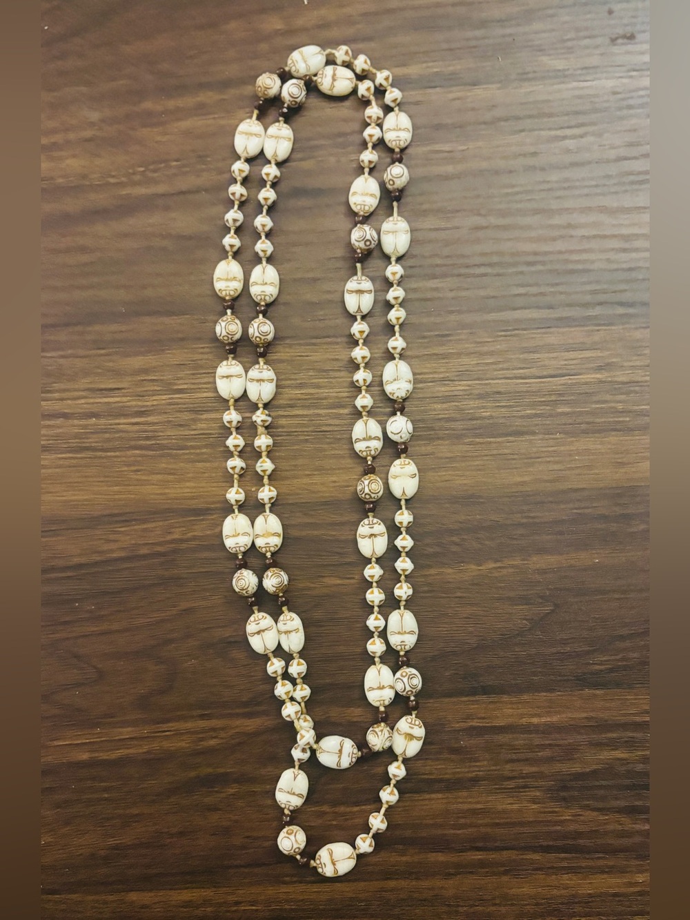 Elegant Cream Beaded Long Necklace with Gold Accents